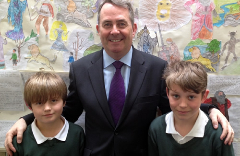 Dr Liam Fox with St Johns pupils